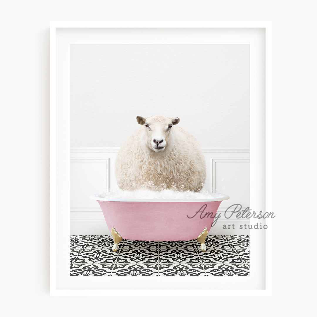 a sheep is sitting in a pink bathtub