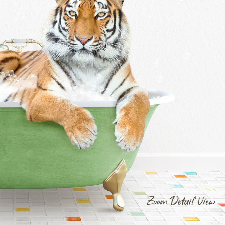 A tiger is sitting in a green bathtub, with its paws resting on the side of the tub.