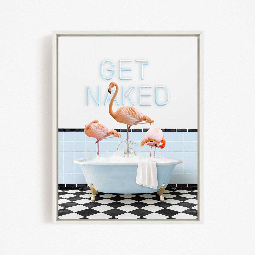 A framed image depicting three flamingos standing in a bathtub, with a sign above them that says "GET NAKED".