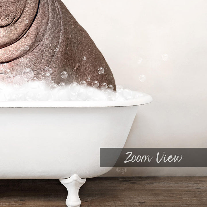 A white bathtub filled with bubbles, with a large, curled object partially submerged in the water.