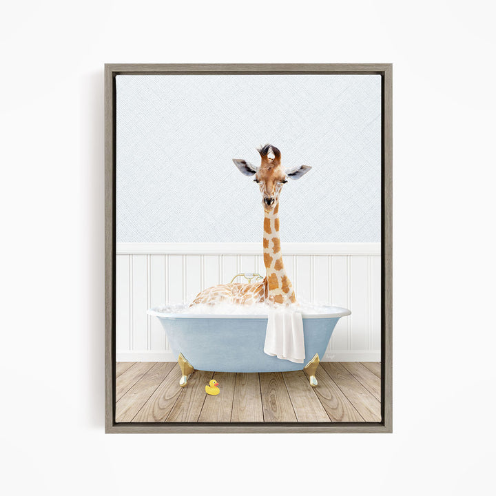 A giraffe is sitting in a blue bathtub filled with water, surrounded by rubber ducks.