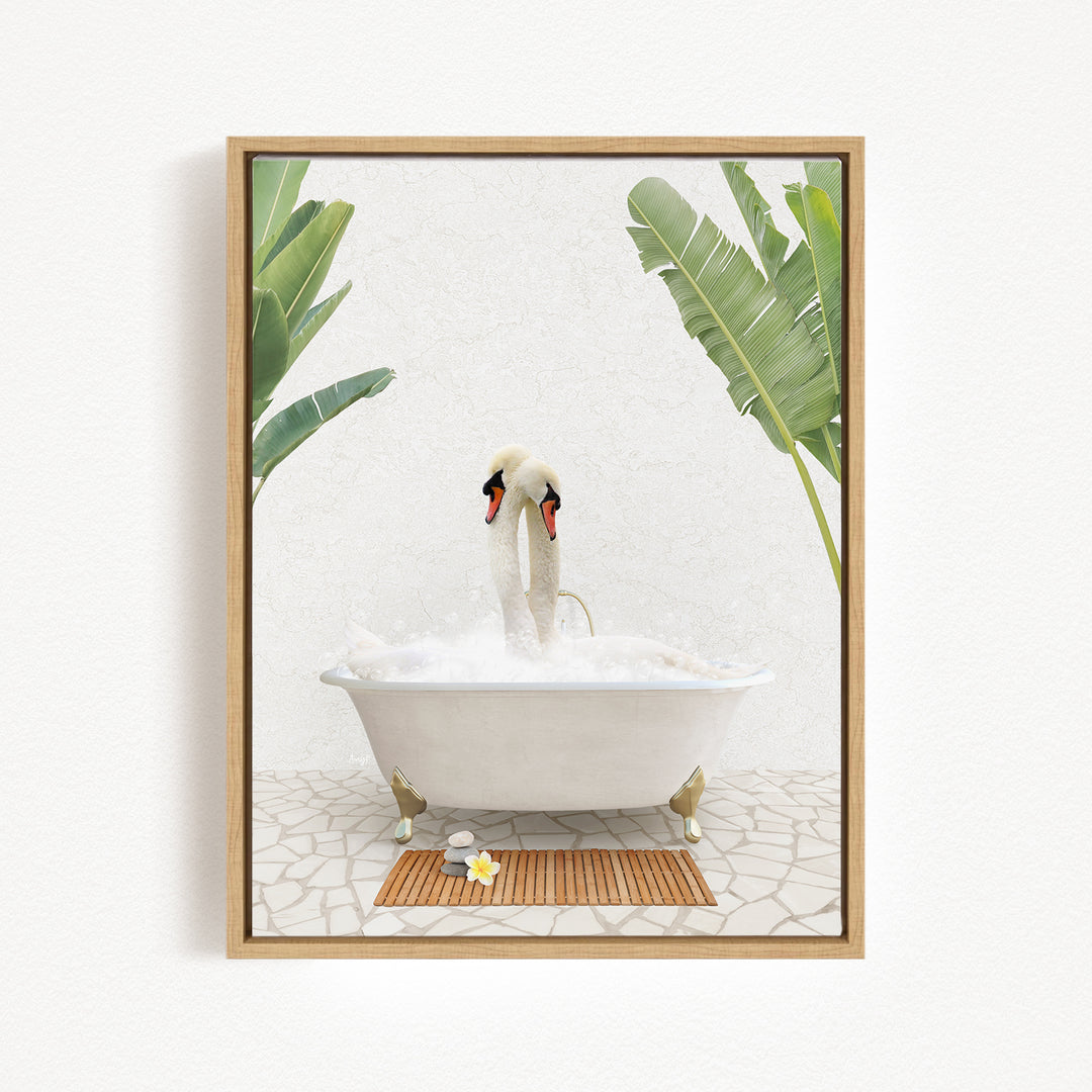 A white swan is sitting in a white bathtub filled with bubbles, surrounded by two green plants.