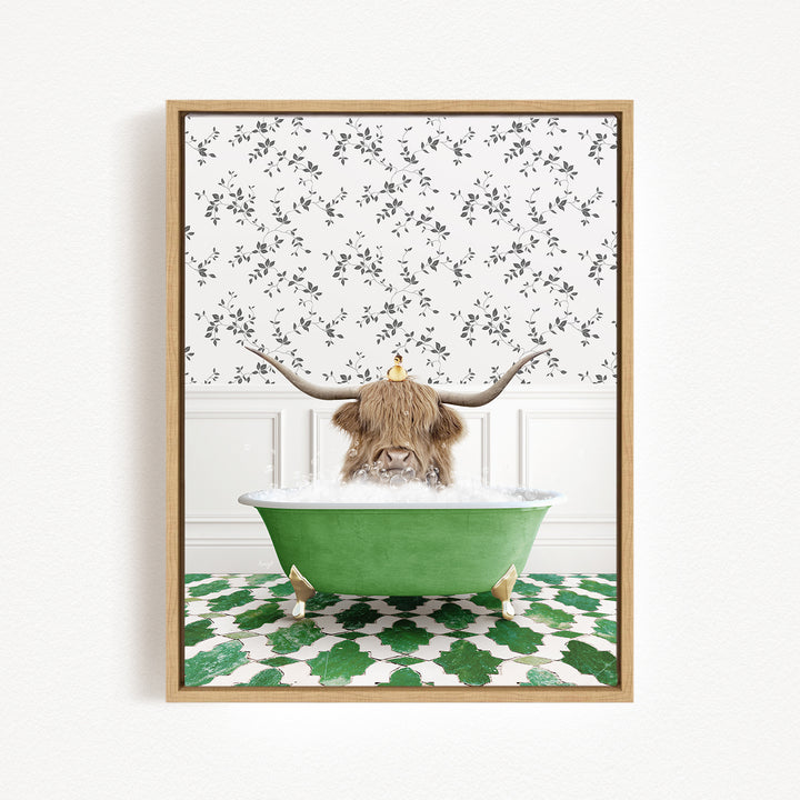 A Highland cow with large horns is sitting in a green bathtub filled with bubbles, surrounded by a patterned tile floor and a floral wallpaper background.