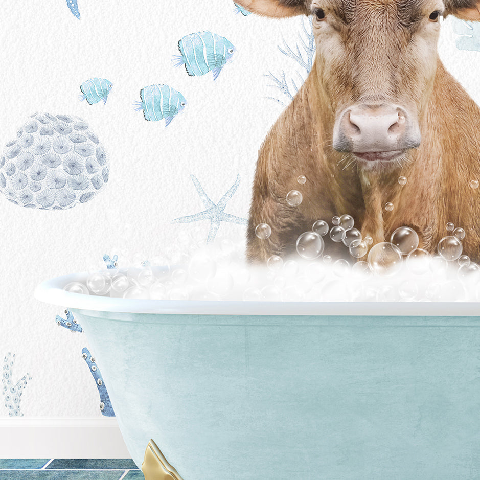 a cow sitting in a bathtub filled with bubbles