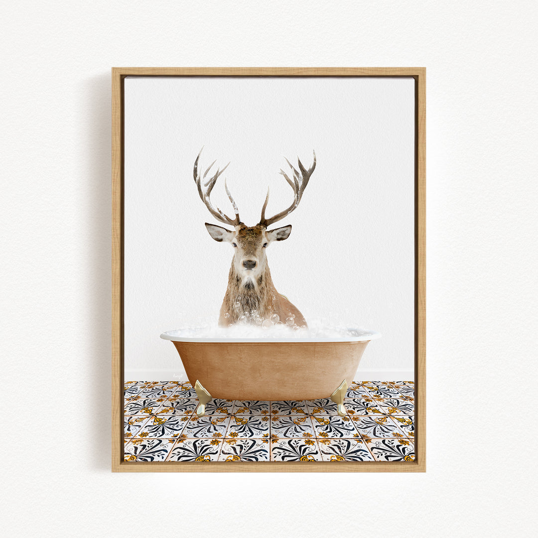 A deer with large antlers is sitting in a bathtub filled with water, creating a whimsical and unexpected scene.