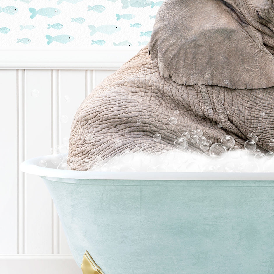 an elephant is sitting in a bathtub with foam