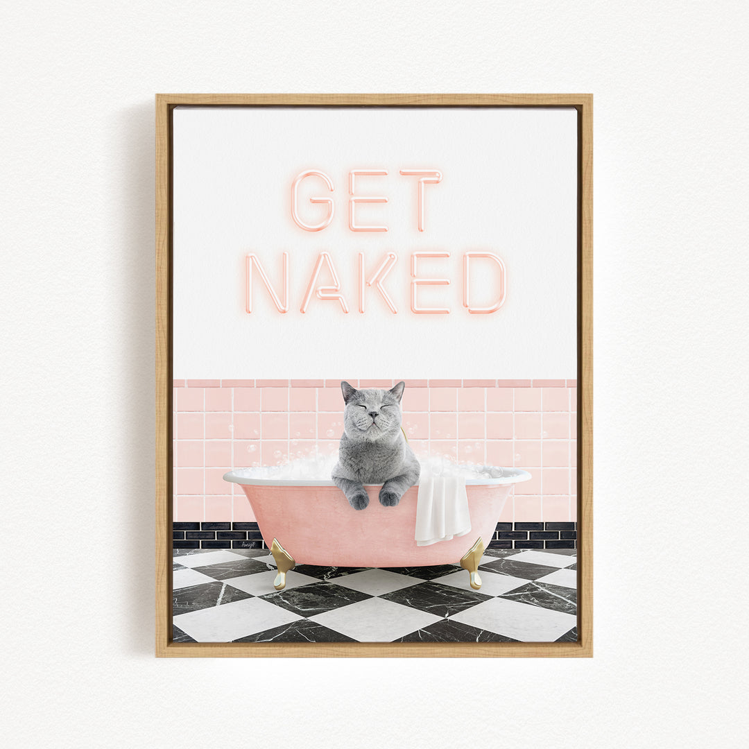 A framed image depicting a gray cat sitting in a pink bathtub, with the text "GET NAKED" displayed above it.