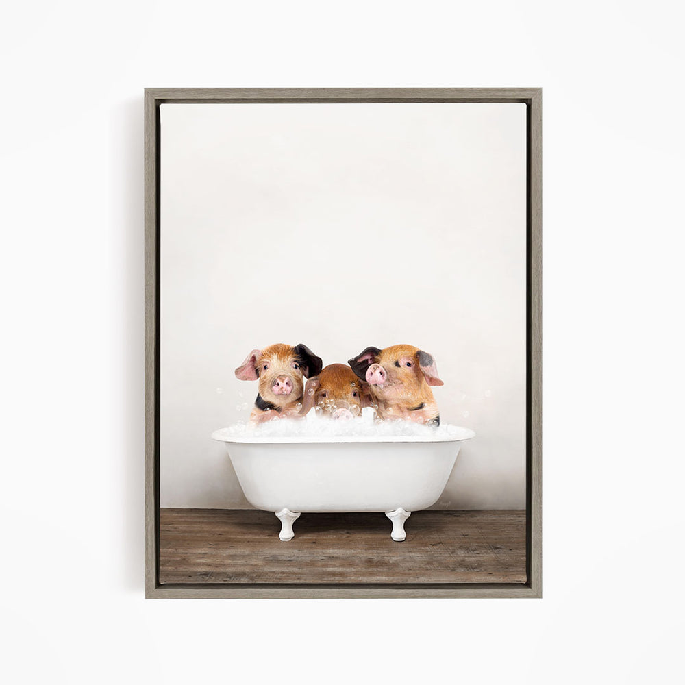Three adorable pigs sitting in a white bathtub, enjoying a relaxing bath together.