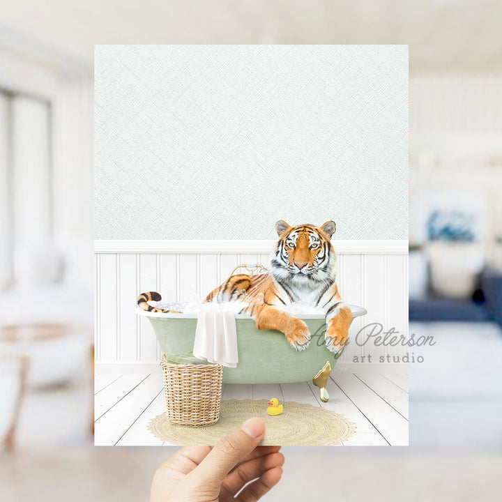 a hand holding up a card with a picture of a tiger in a bathtub