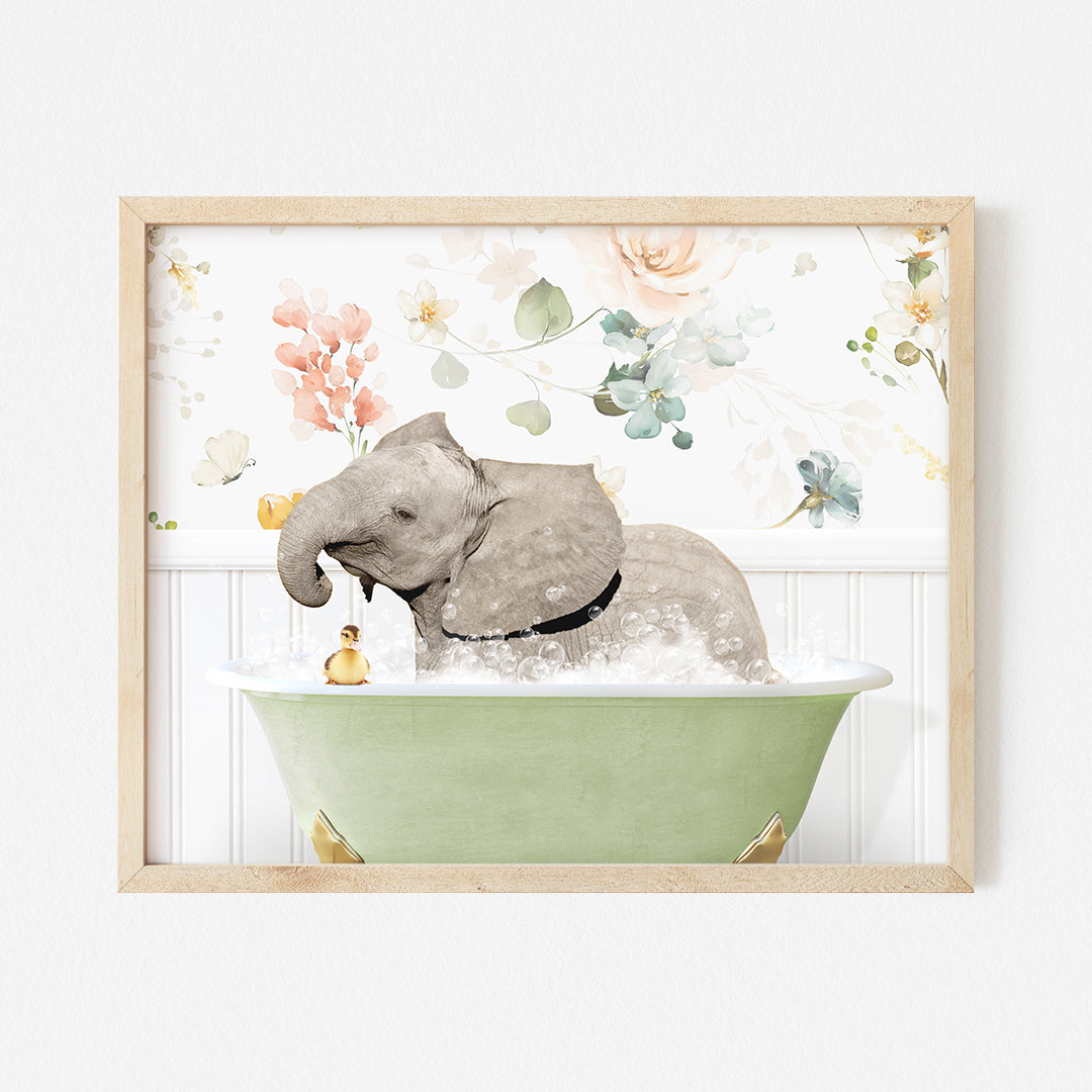 an elephant taking a bath in a green bathtub