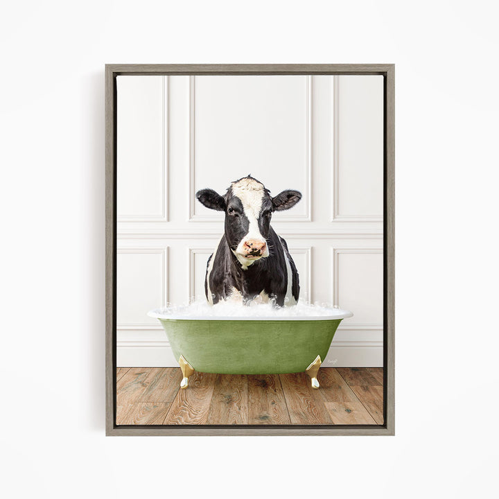 A black and white cow standing in a green bathtub filled with water, creating a humorous and whimsical scene.