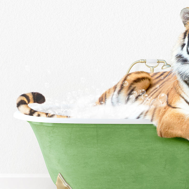 a stuffed tiger sitting in a bath tub