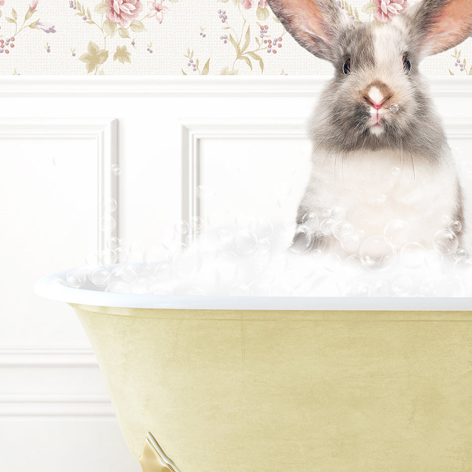 a rabbit is sitting in a bathtub full of foam