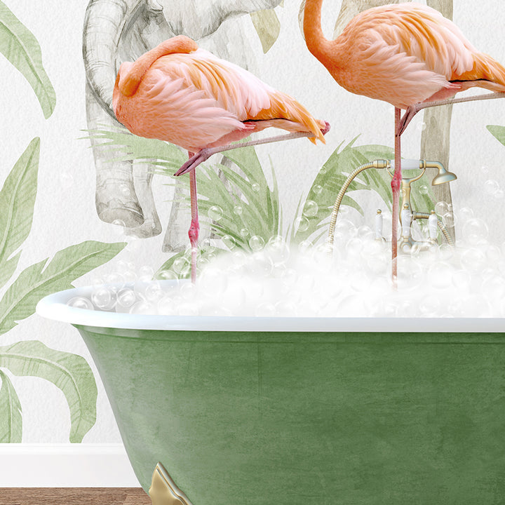 two flamingos are standing in a bathtub full of bubbles