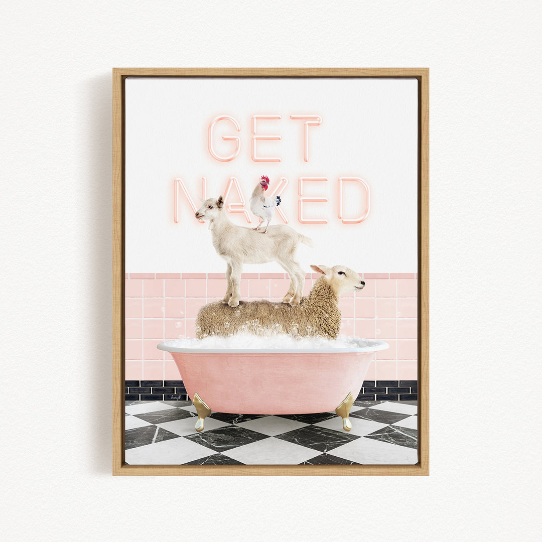 A framed image depicting a goat standing on a sheep in a pink bathtub, with the words "GET NAKED" written above them.