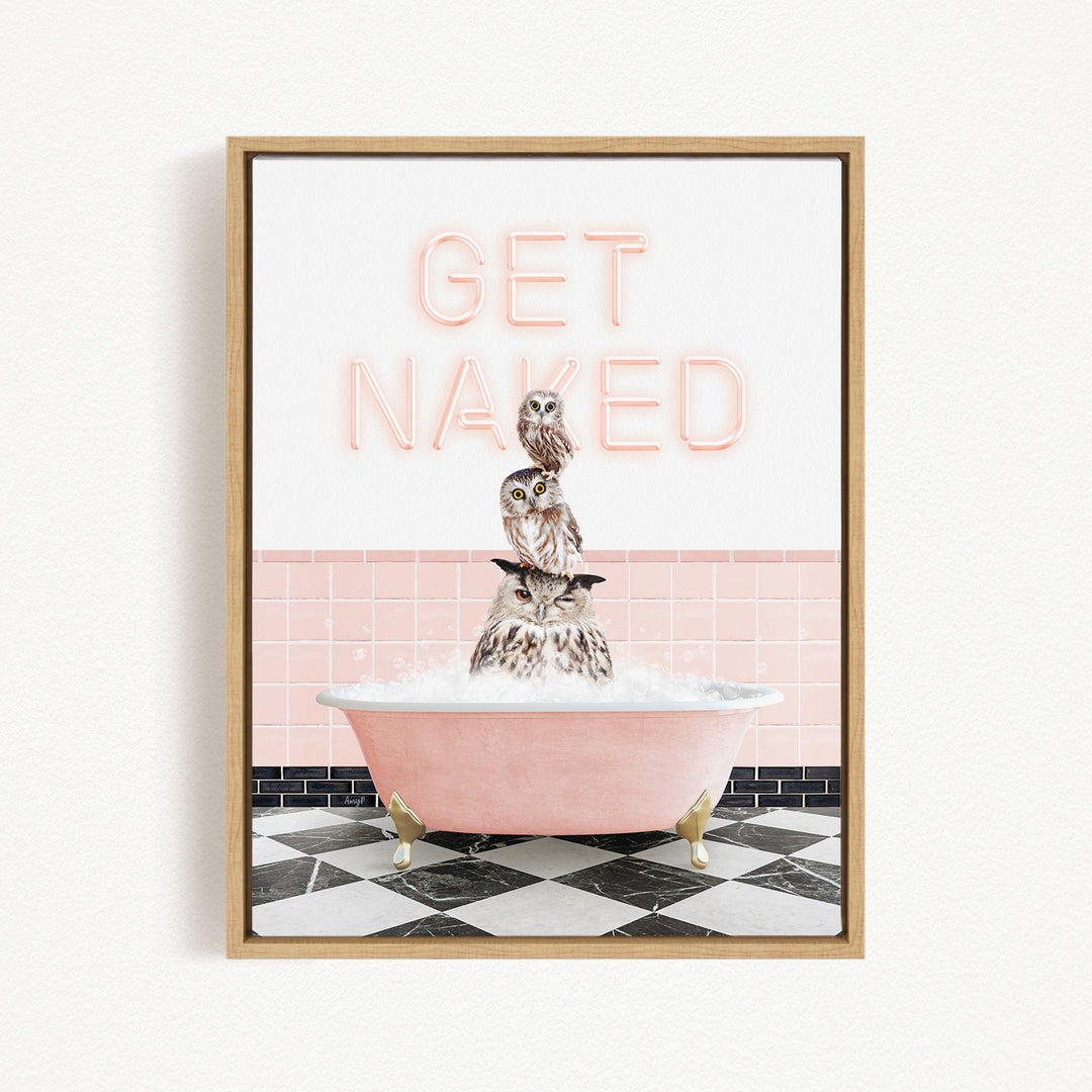 A framed image depicting a pink bathtub filled with water, with three owls sitting inside. The text "GET NAKED" is displayed above the owls.