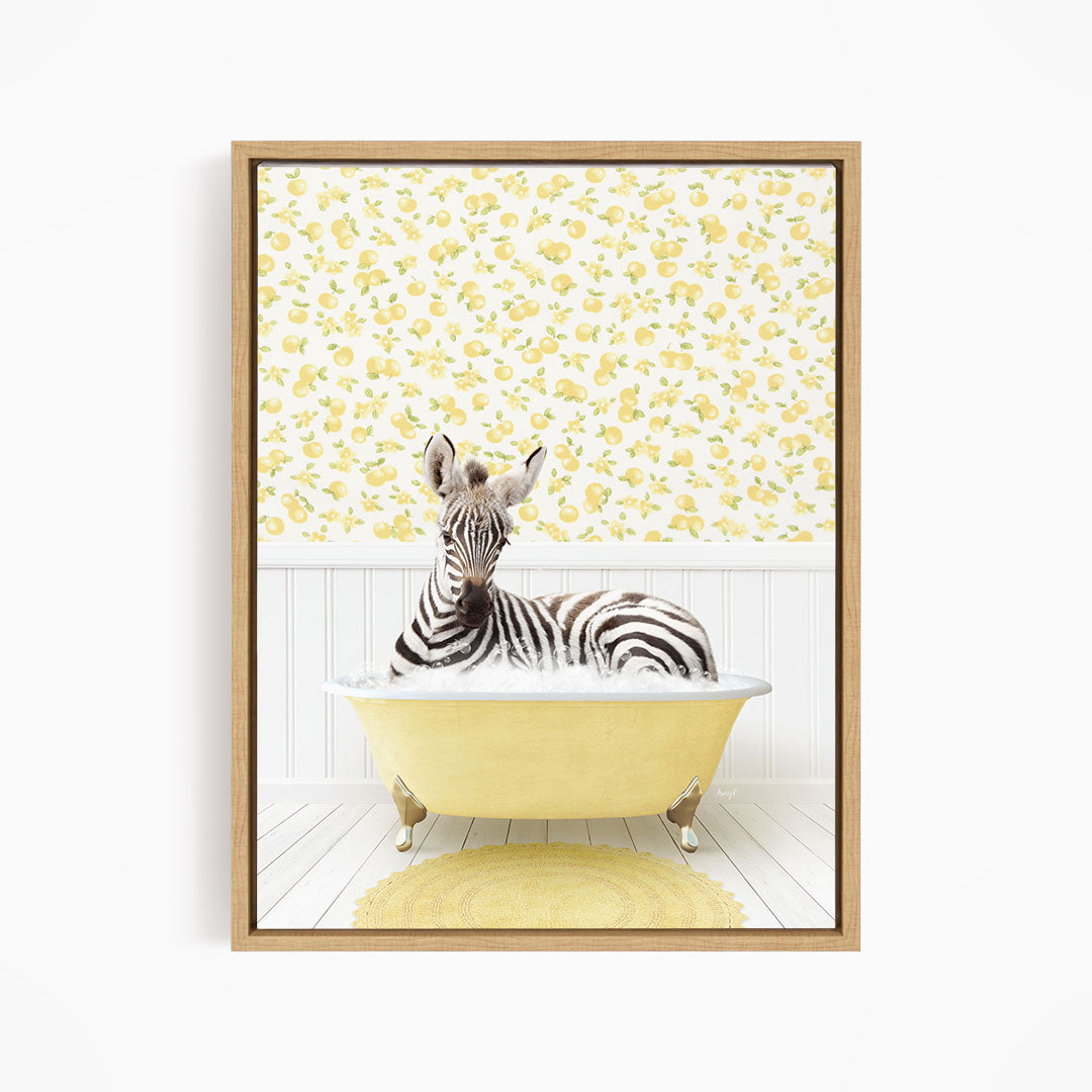 A zebra is sitting in a yellow bathtub, surrounded by a yellow and white floral pattern on the wall behind it.