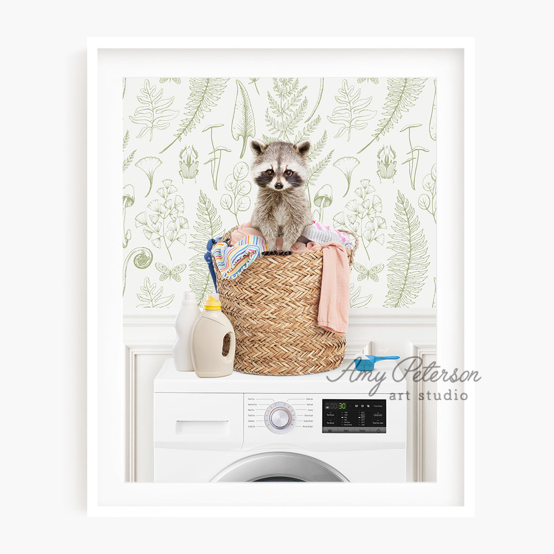 a raccoon sitting on top of a laundry basket