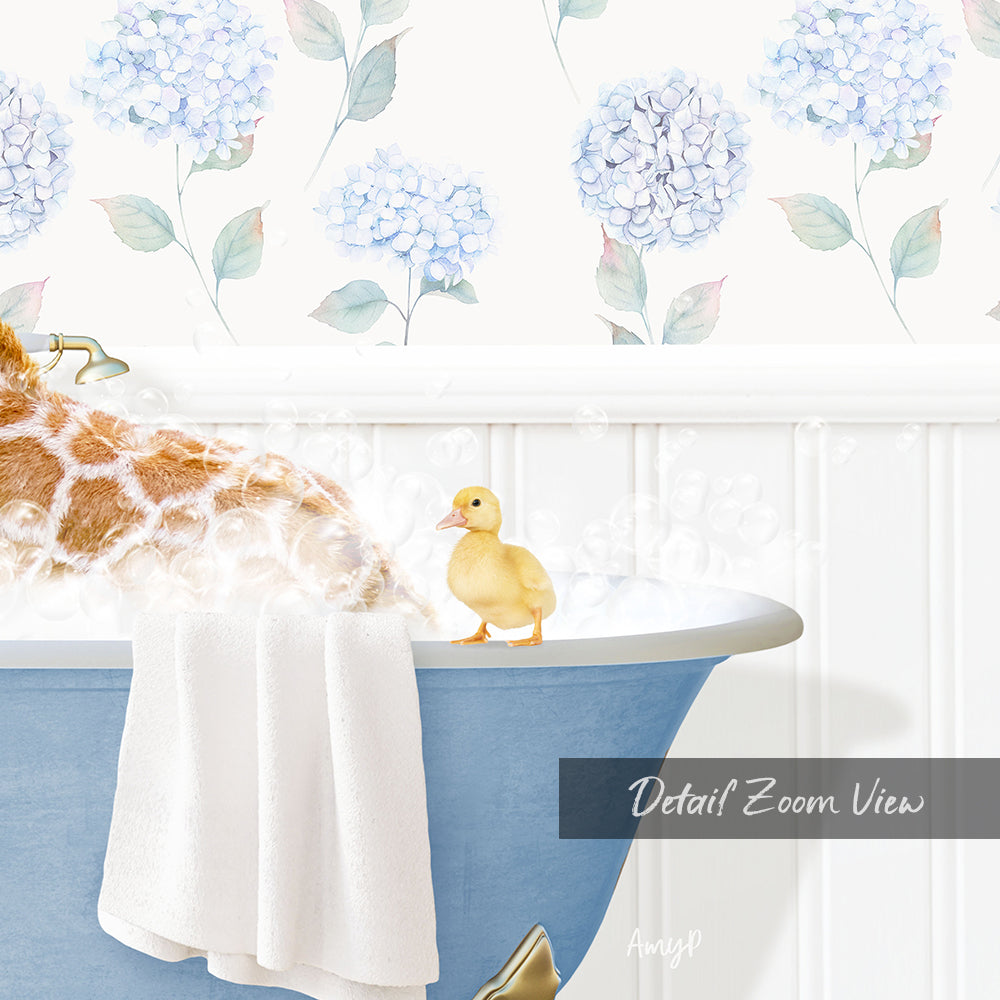 A giraffe is taking a bath in a blue bathtub, with a small yellow duck sitting on the edge of the tub.