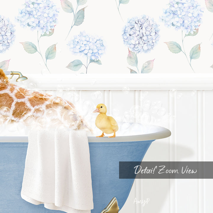 A giraffe is taking a bath in a blue bathtub, with a small yellow duck sitting on the edge of the tub.