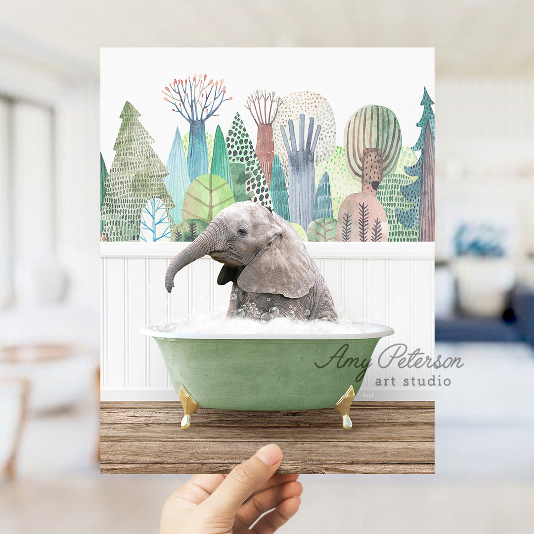 a person holding a card with a picture of a baby elephant in a bathtub