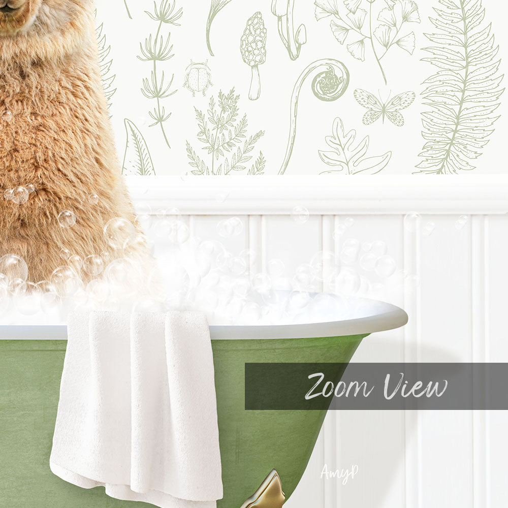 A fluffy brown cat sitting in a green bathtub filled with bubbles, with a white towel draped over the side and a green wall with various botanical illustrations in the background.