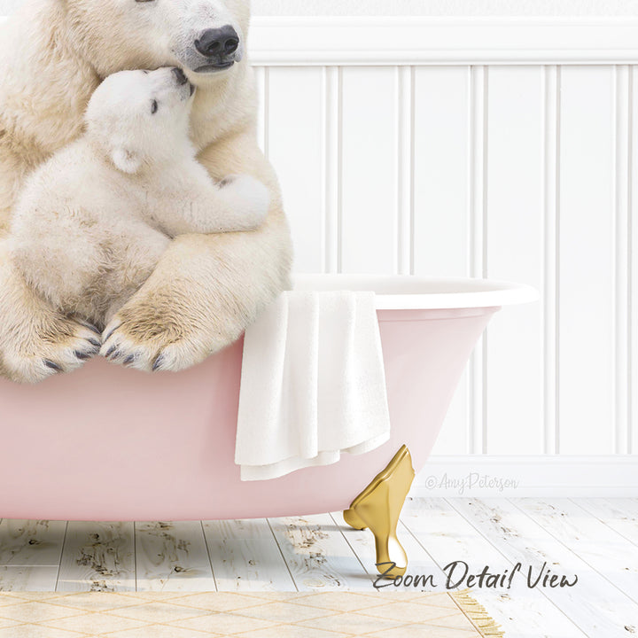 A mother polar bear and her cub cuddling in a pink bathtub, with a gold bathtub faucet and towel nearby.