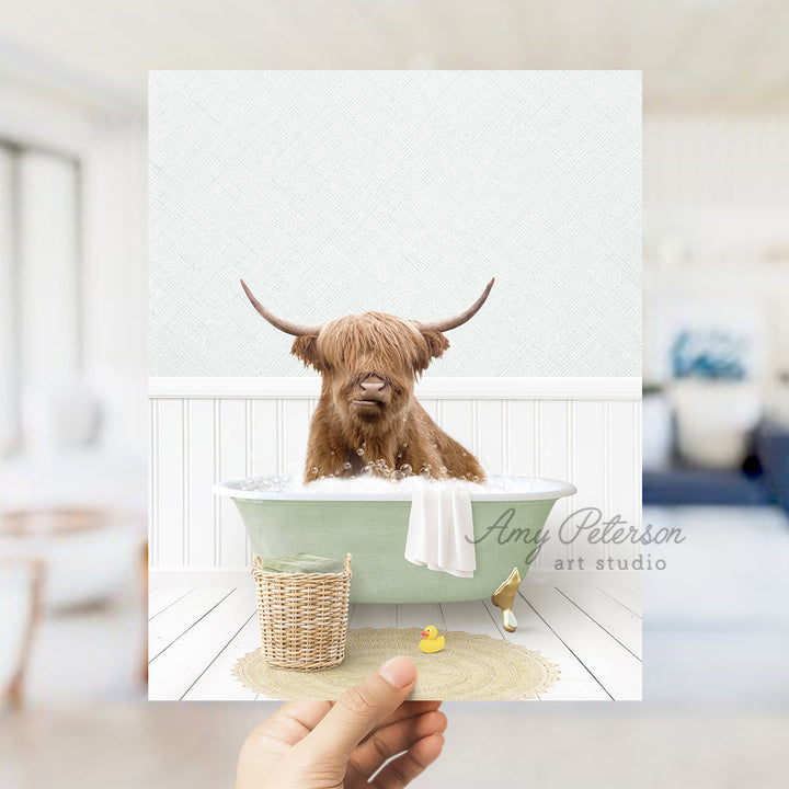 a person holding a card with a picture of a dog in a bathtub