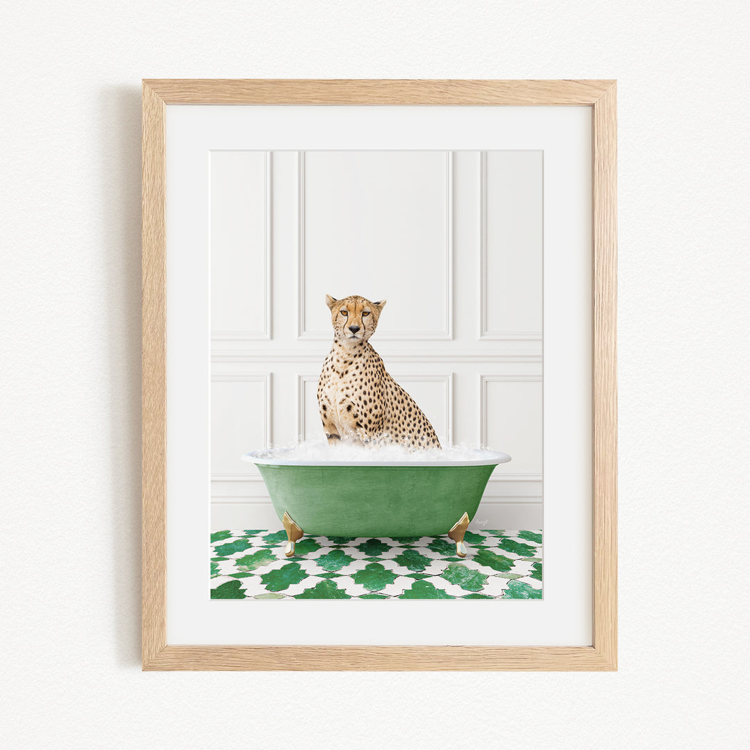 A cheetah sitting in a green bathtub filled with water, surrounded by a green and white patterned rug.