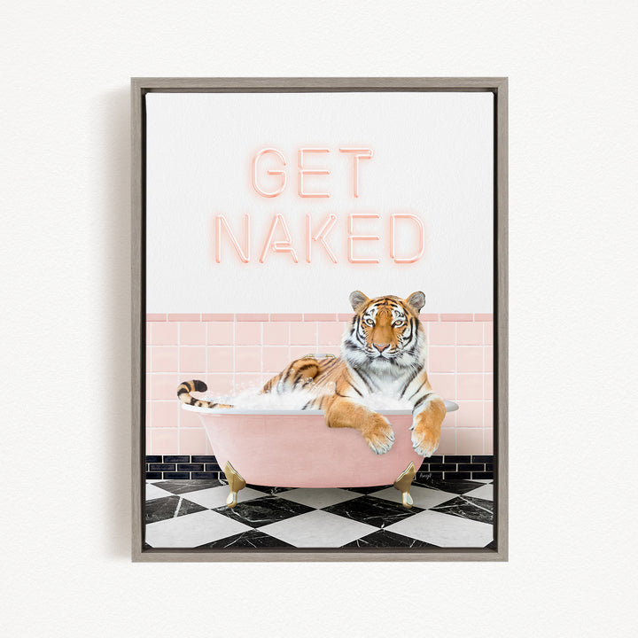 A tiger is sitting in a pink bathtub, with the text "GET NAKED" displayed above it.