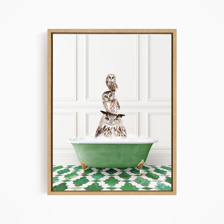 A framed image depicting a group of owls sitting in a green bathtub filled with water, creating a whimsical and playful scene.