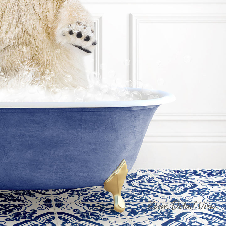 A polar bear is standing in a blue bathtub filled with bubbles, with its paw raised above the water.