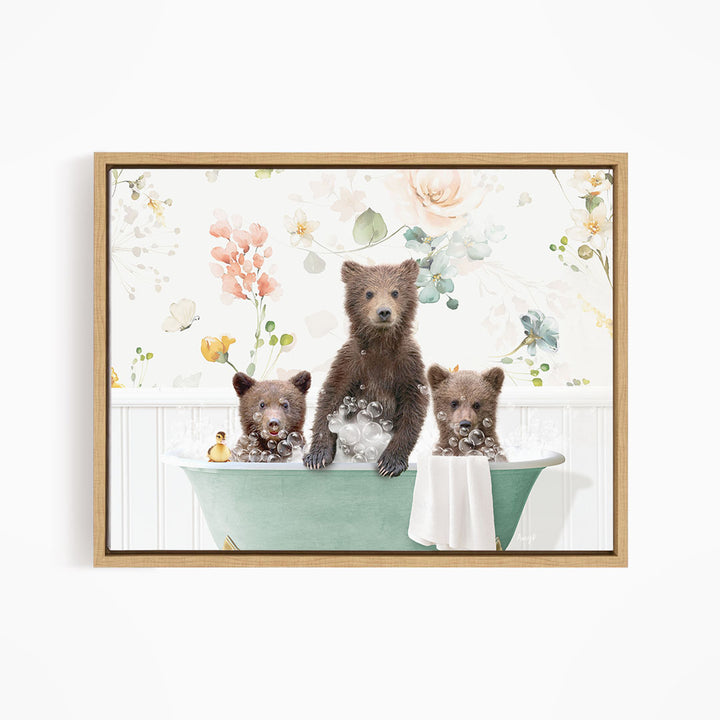 A framed image depicting three bears sitting in a green bathtub, surrounded by flowers and a floral pattern.