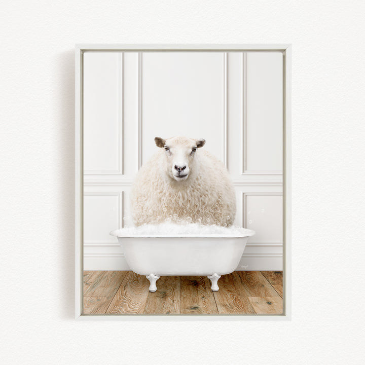 A fluffy white sheep sits in a white bathtub filled with bubbles, creating a whimsical and playful scene.