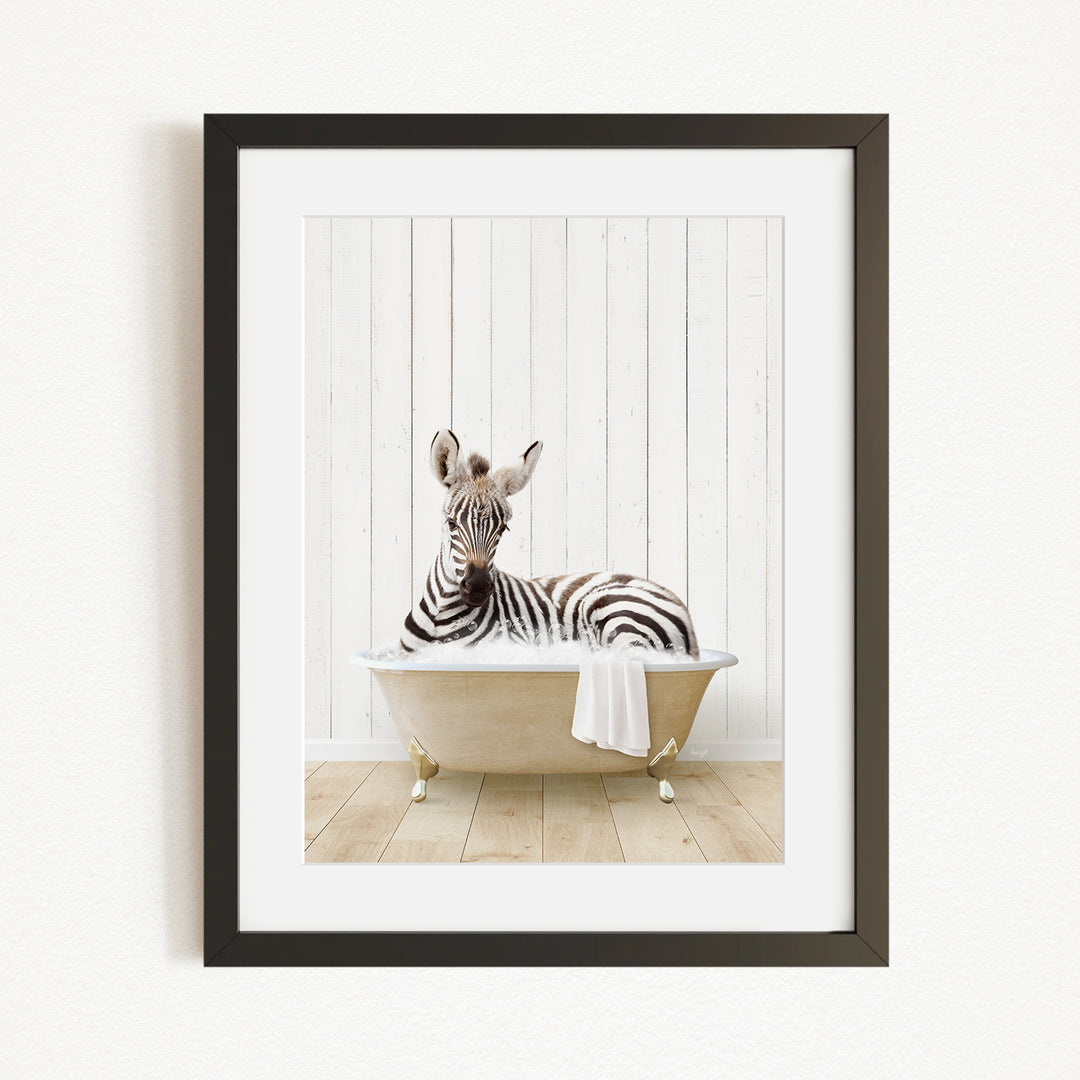 A zebra is sitting in a bathtub filled with water, creating a whimsical and playful scene.