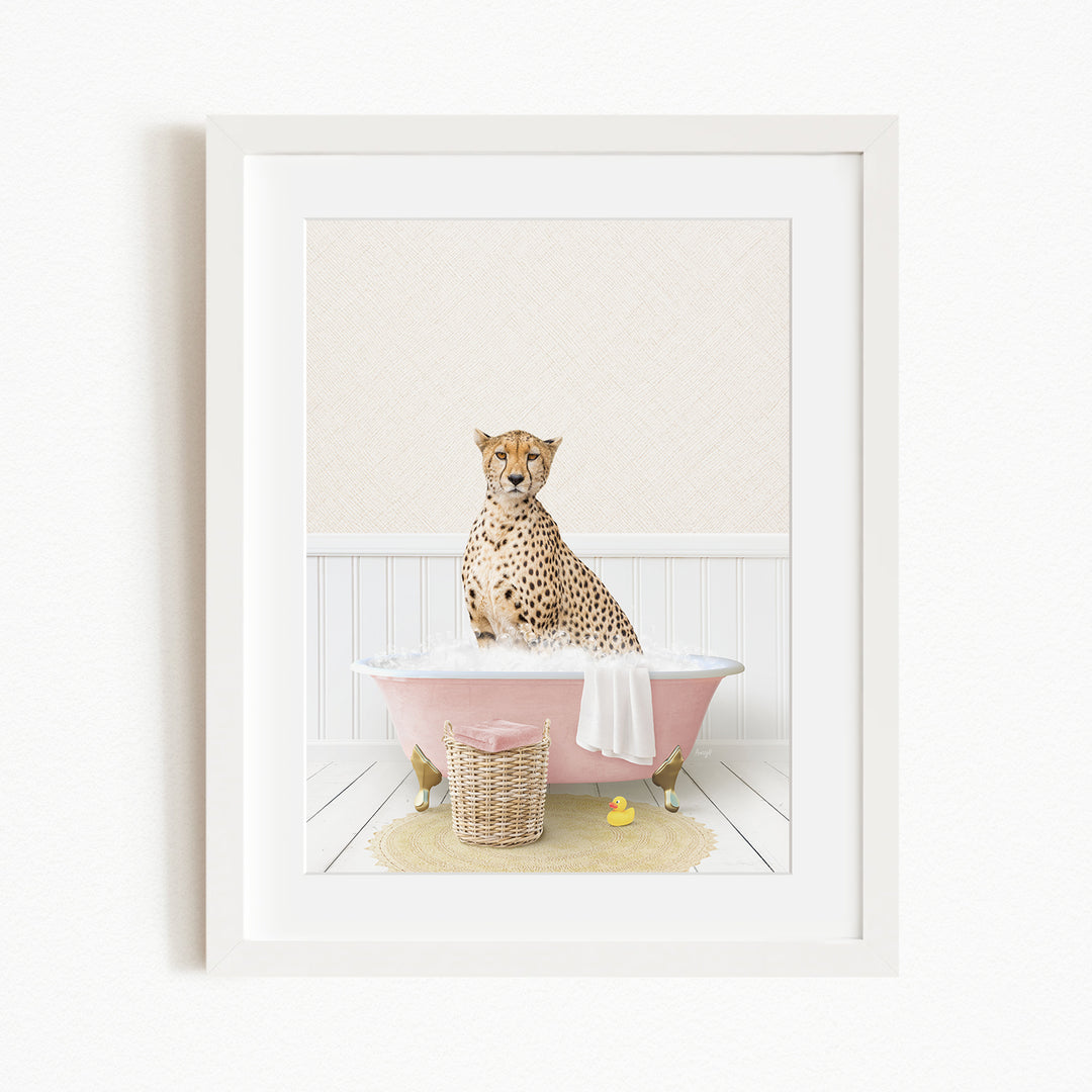 A cheetah sitting in a pink bathtub filled with water, surrounded by rubber ducks.