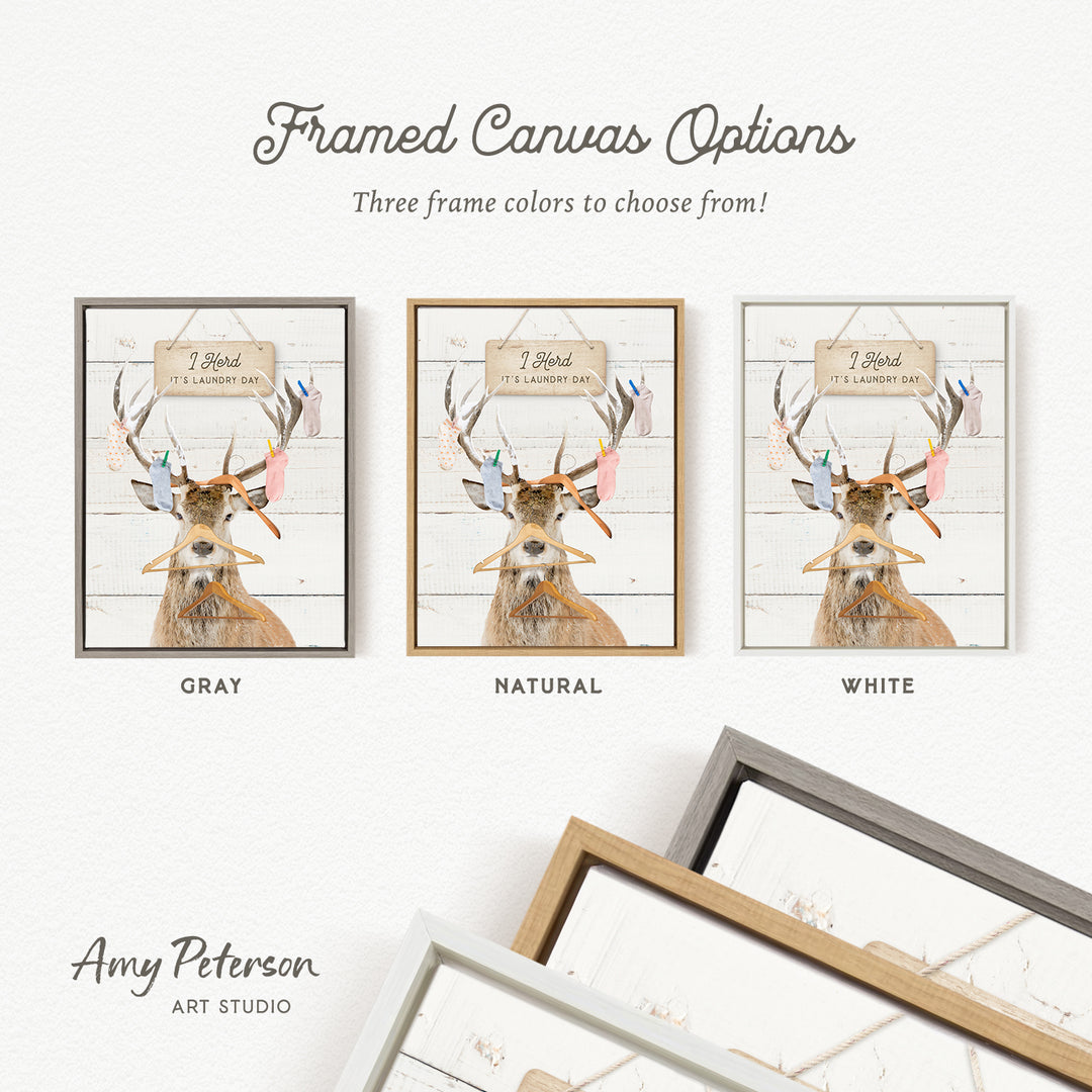 three framed canvas options, each featuring a deer with antlers and a sign that reads "I hold it's laundry day". The options include a gray frame, a natural frame, and a white frame.