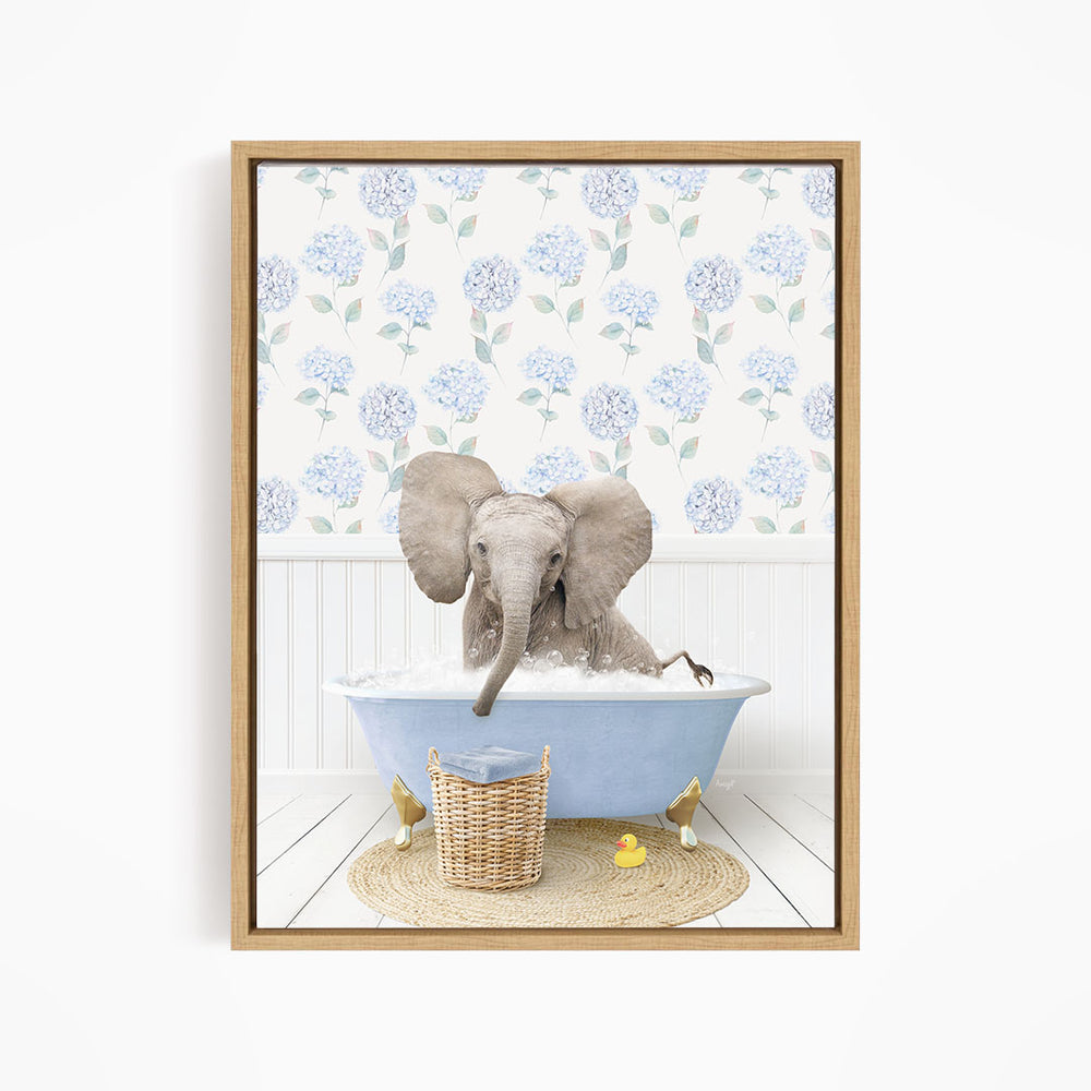 A gray elephant is sitting in a blue bathtub filled with water, surrounded by yellow rubber ducks.