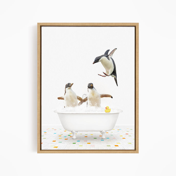 A framed image depicting three penguins sitting in a bathtub, with one penguin flying towards the others.