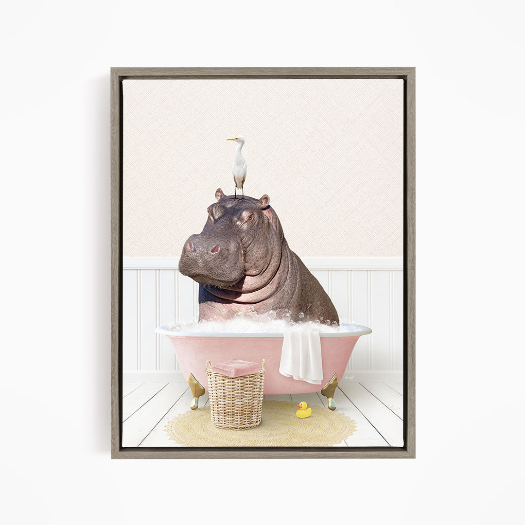 A hippopotamus sitting in a pink bathtub, with a bird perched on its head, and a basket of rubber ducks nearby.