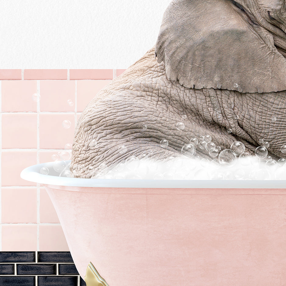 an elephant is taking a bath in a bathtub