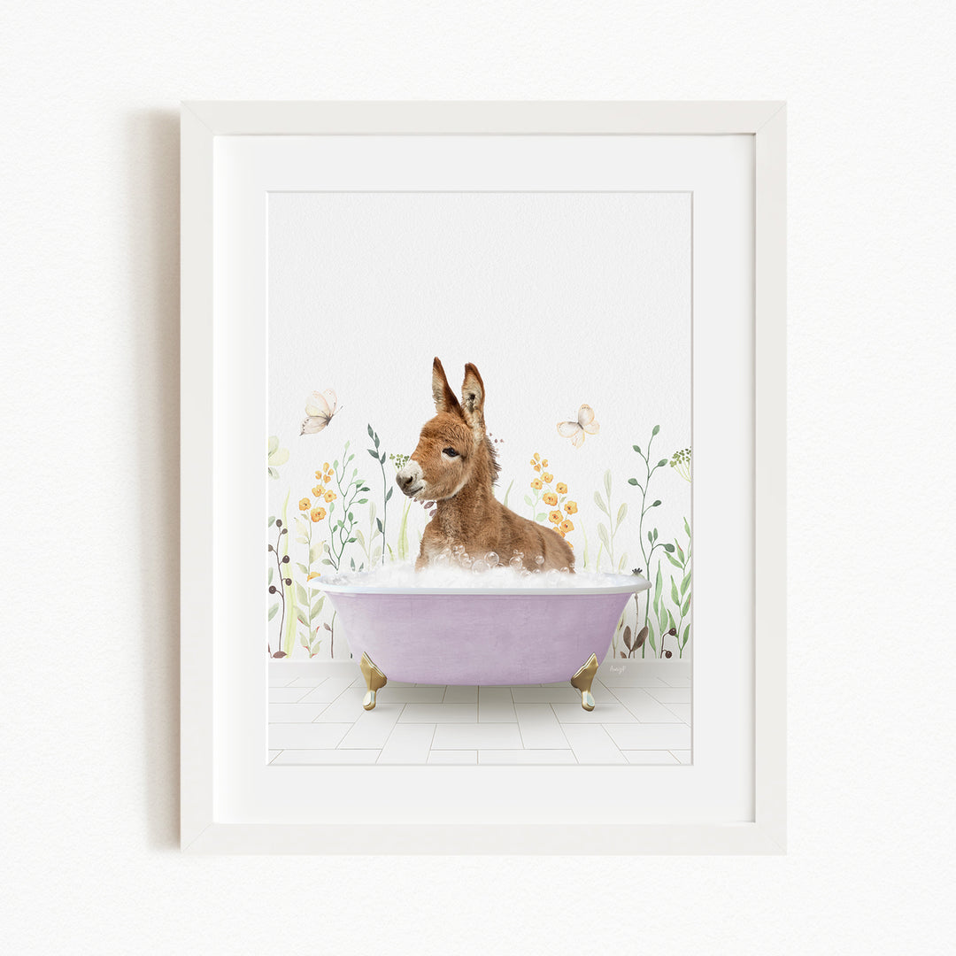 A brown rabbit sitting in a purple bathtub filled with bubbles, surrounded by flowers and butterflies.