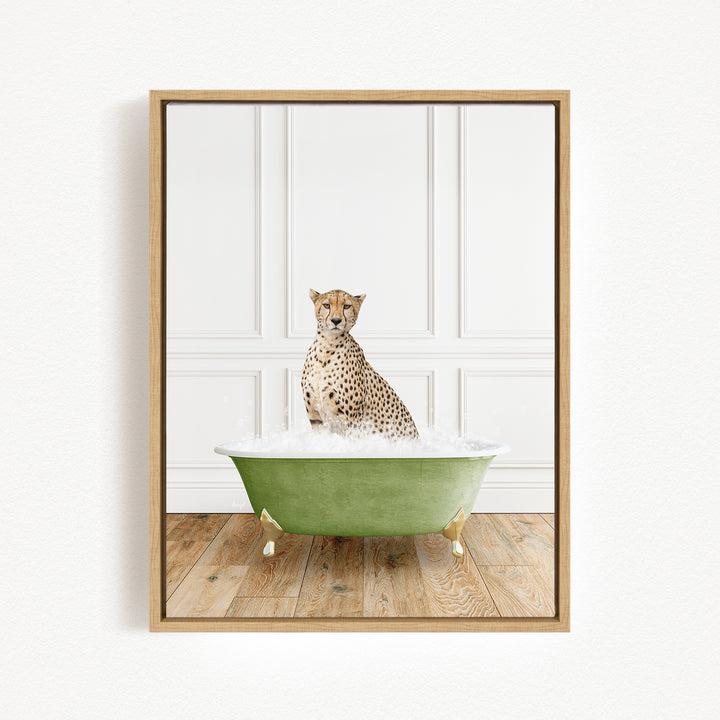 A cheetah sitting in a green bathtub filled with water, with a white wall and wooden floor in the background.