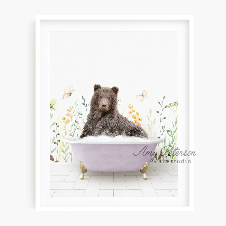 a dog sitting in a bathtub with flowers on the wall behind it