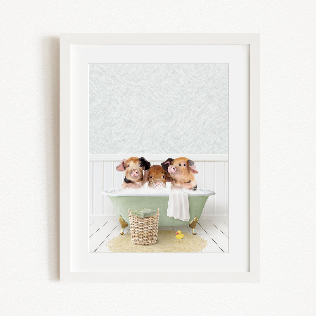 Three adorable pigs sitting in a green bathtub, enjoying a relaxing bath together.