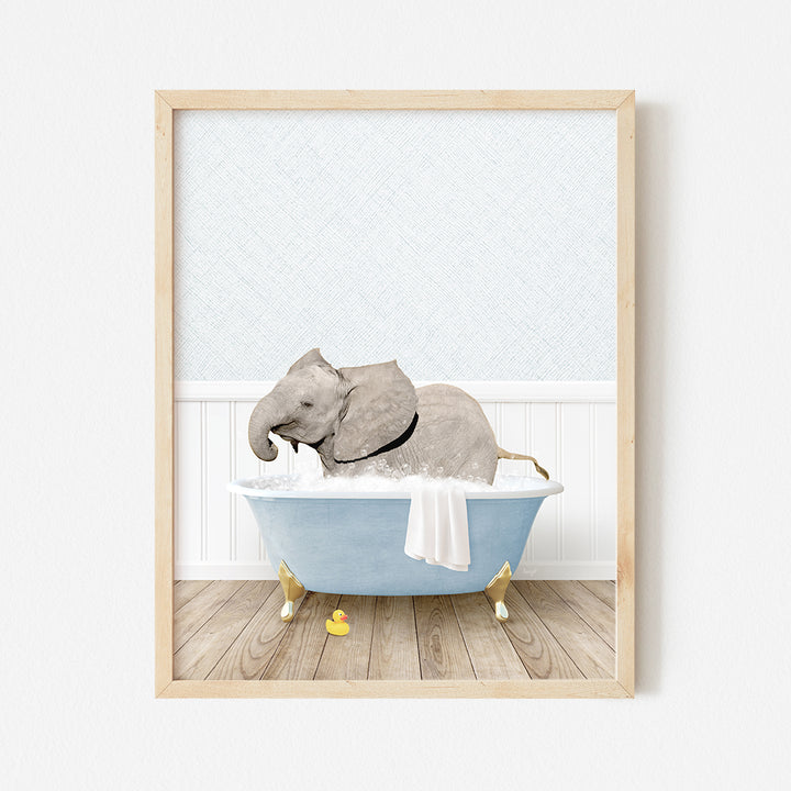 a picture of an elephant taking a bath