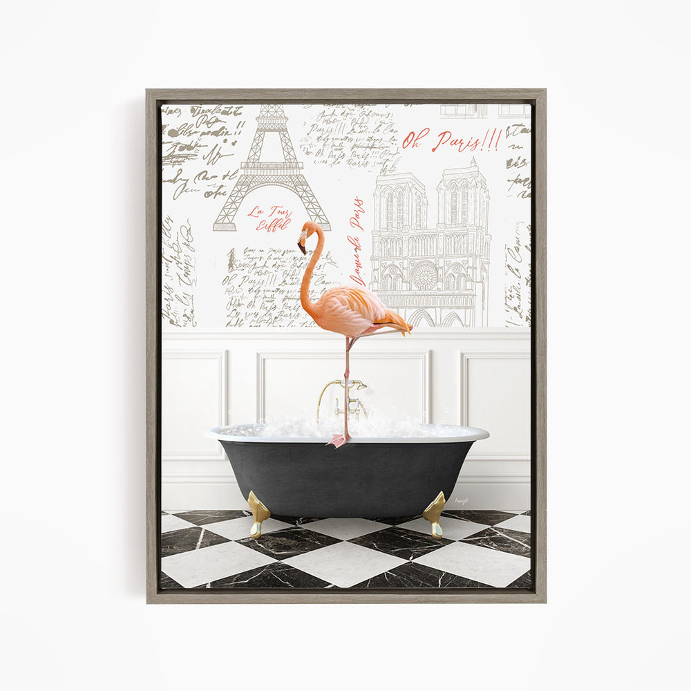 A pink flamingo stands on the edge of a bathtub filled with water, with a Paris-themed wallpaper in the background.