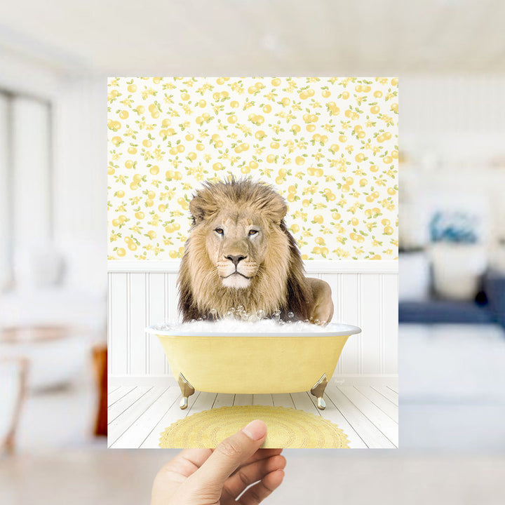 A lion sitting in a yellow bathtub filled with bubbles, surrounded by a yellow and white floral pattern.