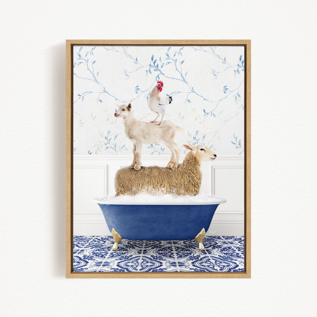 A framed image depicting a sheep standing on a goat's back while a chicken stands on top of a sheep in a blue bathtub.