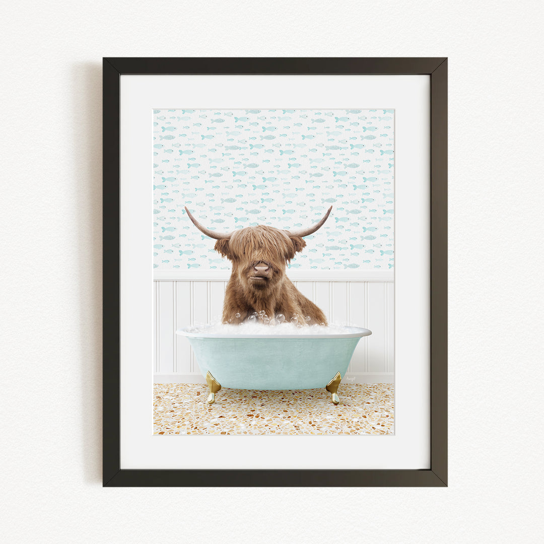 A brown cow with long horns is sitting in a light blue bathtub, surrounded by a patterned tile floor and a white wall with a blue and white fish wallpaper.